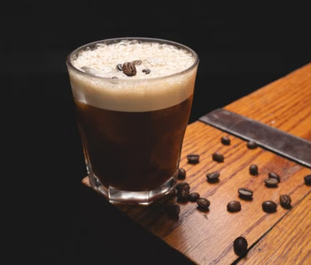 Traditional espresso macchiato topped with a small amount of steamed milk