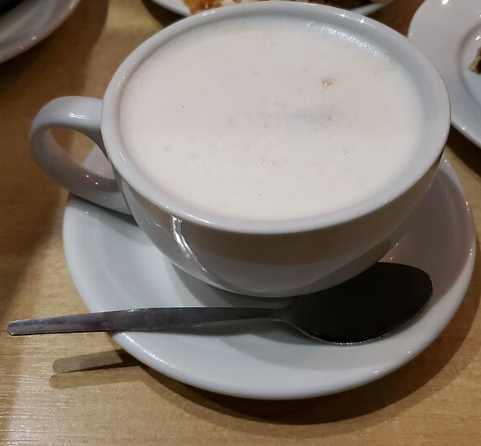 Hot London Fog made with Earl Grey tea, vanilla, steamed milk, and foam