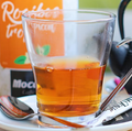 Hot rooibos herbal tea in a clear glass