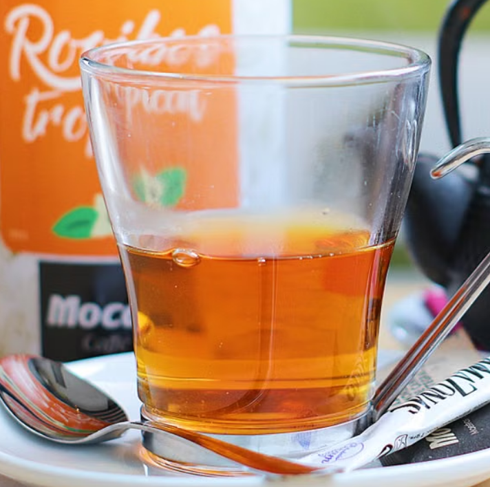 Hot rooibos herbal tea in a clear glass